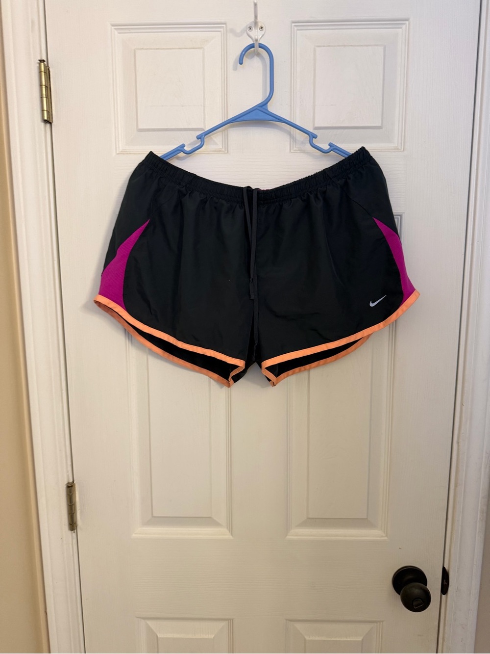 Nike Women's Black Athletic Shorts with Pink Panels and Orange Trim